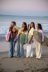 Female surfers at sunset in Jeffreys Bay South Africa